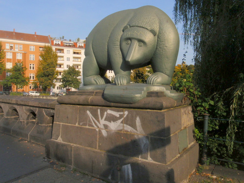 A Bear guards the river bridge.